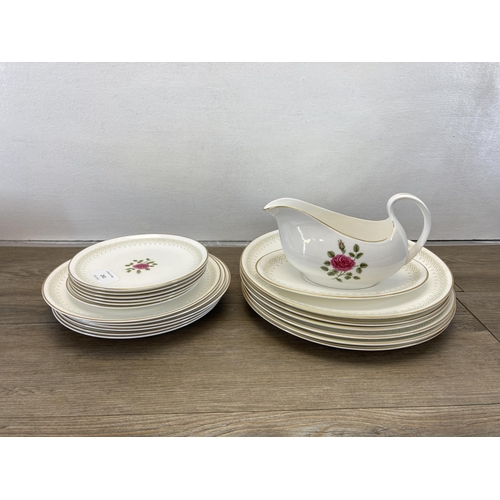 241 - A collection of Royal Doulton Sweetheart Rose dinnerware