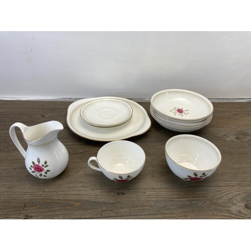 241 - A collection of Royal Doulton Sweetheart Rose dinnerware