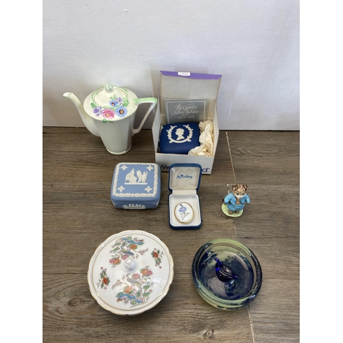 255 - A collection of ceramics and glassware to include Beswick no. 738 panda figurine, Mason's Mandalay j... 