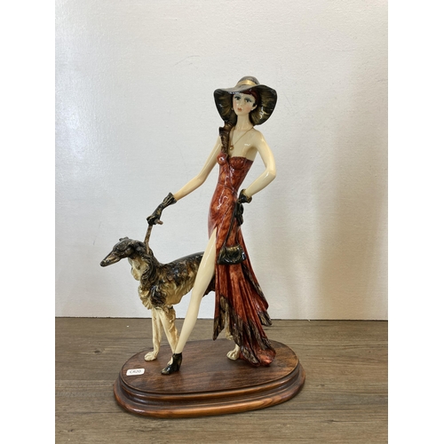 266 - Three Art Deco style resin lady figurines to include A. Santini, The Leonardo Collection etc. - larg... 