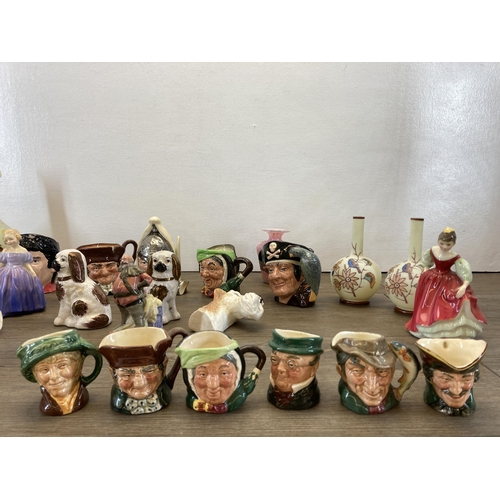 269 - A collection of ceramics and glassware to include ten Royal Doulton miniature character jugs, five R... 