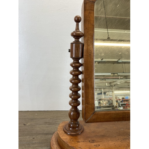 276 - A Victorian mahogany vanity swing mirror with original plate glass and bobbin turned column supports... 