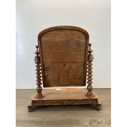 276 - A Victorian mahogany vanity swing mirror with original plate glass and bobbin turned column supports... 