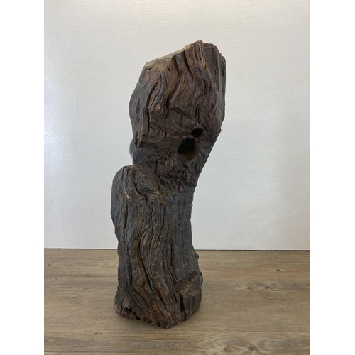 281 - An African carved hardwood sculpture - approx. 55cm high