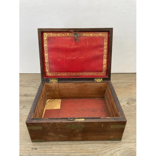 284 - A 19th century rosewood workbox with brass details and red leather interior - approx. 13cm high x 26... 