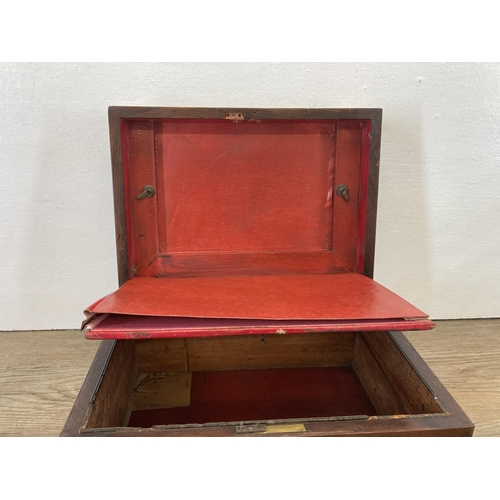 284 - A 19th century rosewood workbox with brass details and red leather interior - approx. 13cm high x 26... 