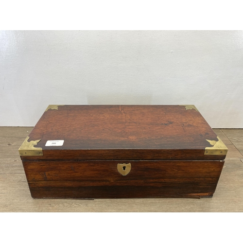 286 - A 19th century rosewood writing slope with brass details and escutcheon - approx. 15.5cm high x 46cm... 