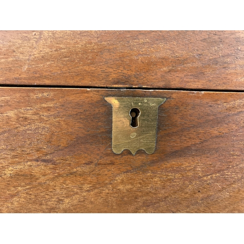 288 - A 19th century mahogany writing slope with brass cartouche and escutcheon - approx. 16cm high x 40cm... 