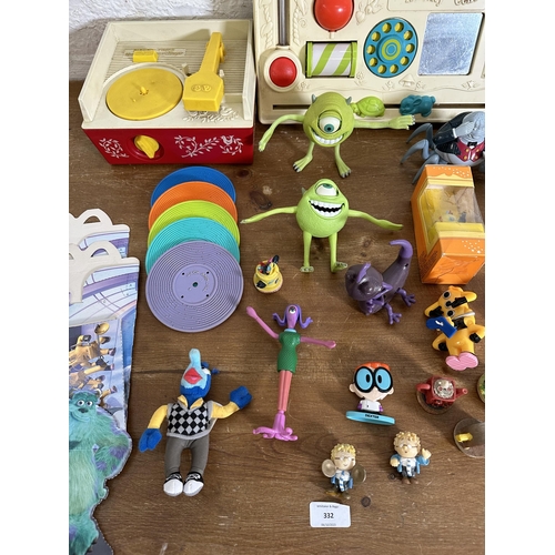 332 - A collection of toys to include a vintage Fisher Price Activity Center, Monster Inc figurines, Fishe... 