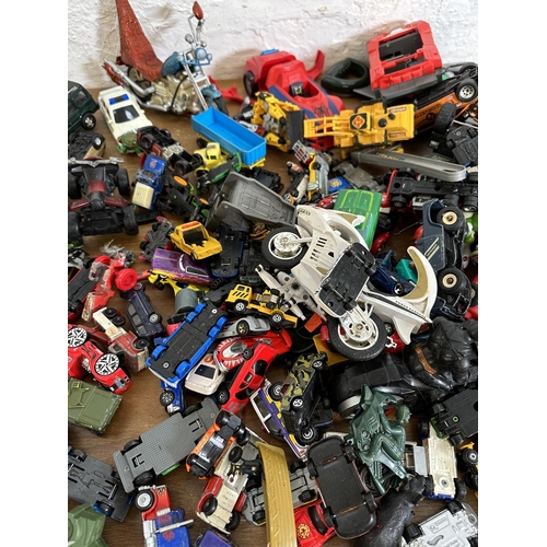 335 - A collection of toys and die-cast model vehicles