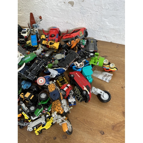 335 - A collection of toys and die-cast model vehicles