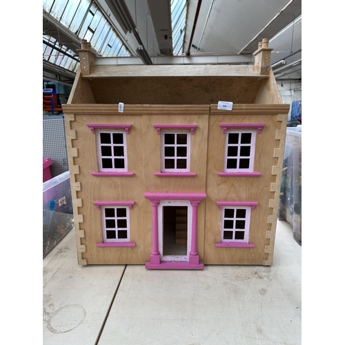 336 - A Georgian style wooden two storey doll's house - approx. 72cm high x 61cm wide x 31cm deep