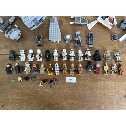 339 - A collection of Star Wars Lego to include Stormtrooper figurines, Darth Vader figurines, Tie Bomber,... 