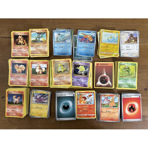 352 - Two Pokémon trading card game metal collectors cases containing approx. 250 Pokémon playing cards