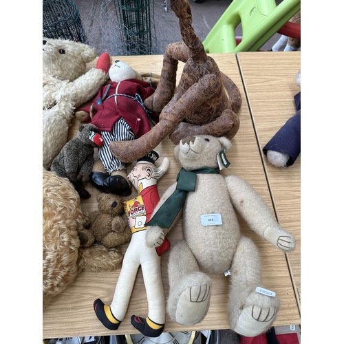 363 - A collection of soft toys to include mid 20th century articulated teddy bear, Aurora Teddy freestand... 