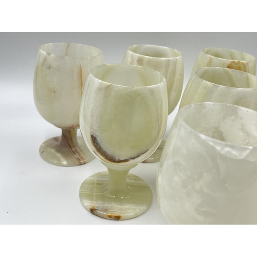 186 - Nine onyx goblets - approx. 12cm high