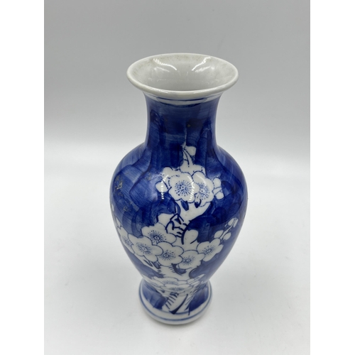 187 - A Chinese Prunus Blossom pattern porcelain vase - approx. 20cm high