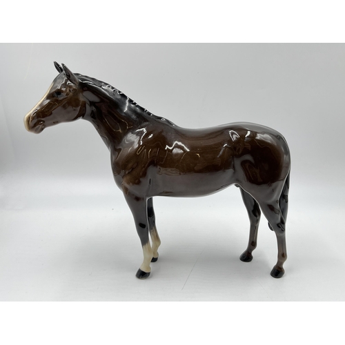 192 - Three Beswick horse figurines to include Black Beauty and Foal etc.