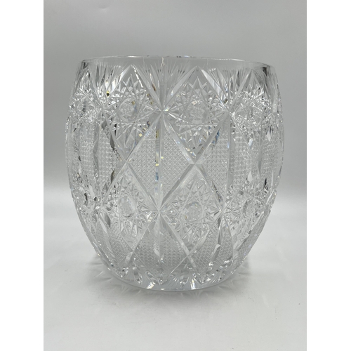 198 - A Bohemian pinwheel cut crystal vase - approx. 19cm diameter x 21cm high