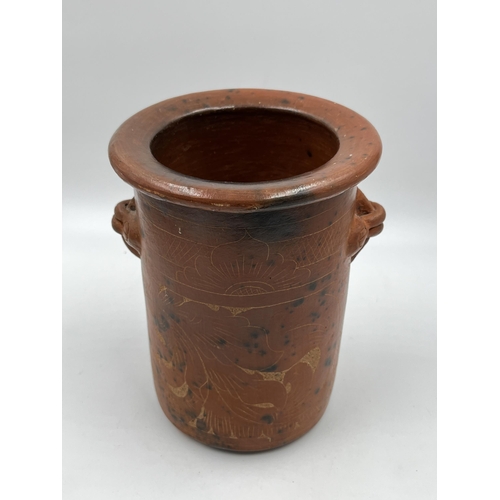 205 - A vintage terracotta utensil holder with engraved floral motifs - approx. 20cm high x 15cm diameter