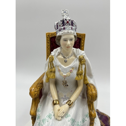 210 - A boxed Royal Doulton Diamond Jubilee limited edition no. 0658/4000 hand decorated bone china figuri... 