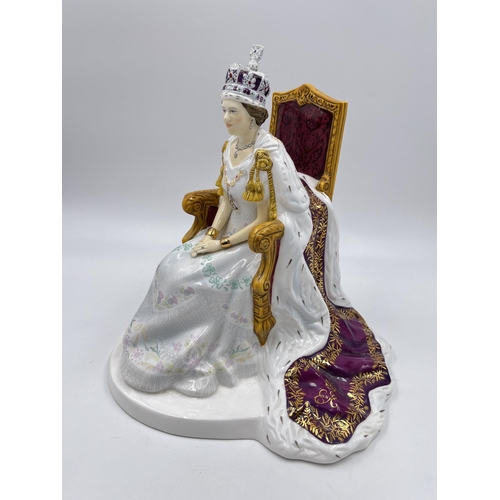 210 - A boxed Royal Doulton Diamond Jubilee limited edition no. 0658/4000 hand decorated bone china figuri... 