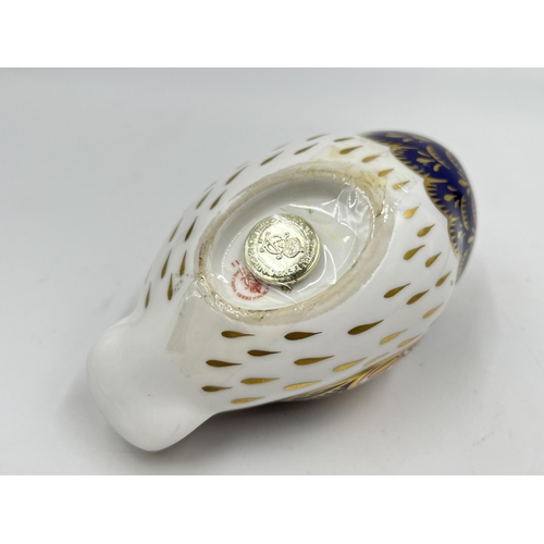 213 - A Royal Crown Derby owl paperweight with silver stopper