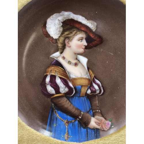 216 - A framed hand painted porcelain wall plaque depicting lady - approx. 27cm x 27cm