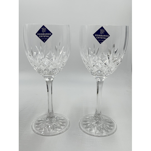 221 - Two boxed pairs of Edinburgh Crystal wine glasses