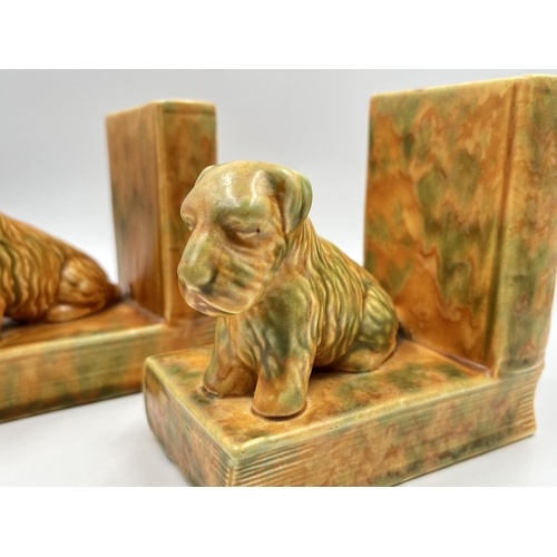 225C - Two Art Deco Beswick mottle glazed ceramic dog bookends - approx. 13cm high