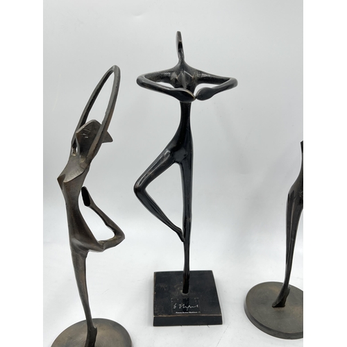 225E - Four Bodrul Khalique bronze ballet dancer figurines - largest approx. 28cm high