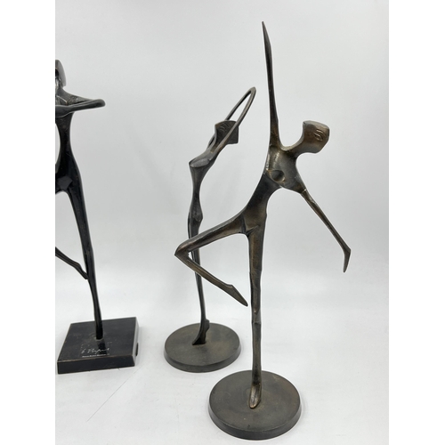 225E - Four Bodrul Khalique bronze ballet dancer figurines - largest approx. 28cm high