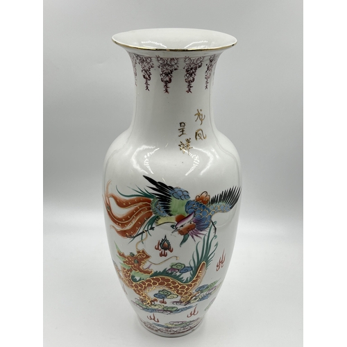 225H - A Chinese hand painted porcelain baluster vase - approx. 27cm high