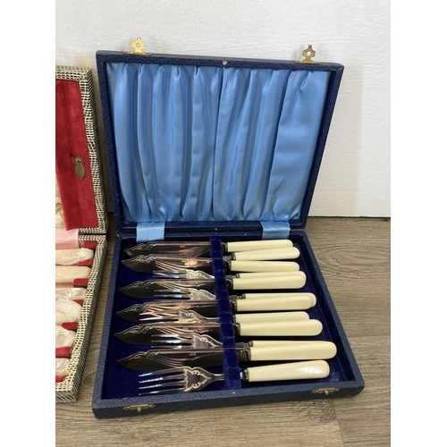 318 - Four cased cutlery sets