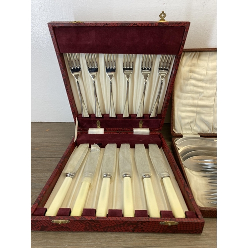 320 - Three cased cutlery sets