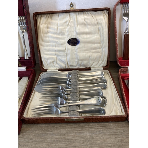 320 - Three cased cutlery sets