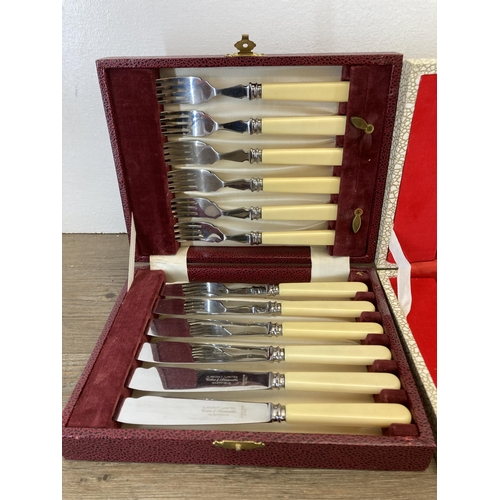 321 - Three cased cutlery sets