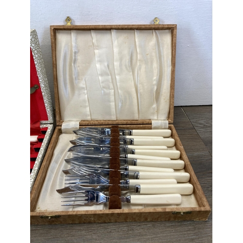 321 - Three cased cutlery sets