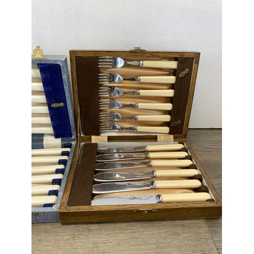 322 - Three cased cutlery sets