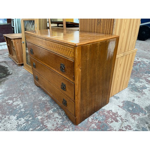 114A - A mid 20th century oak chest of drawers - approx. 70cm high x 91cm wide x 45cm deep