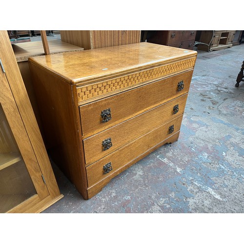 114A - A mid 20th century oak chest of drawers - approx. 70cm high x 91cm wide x 45cm deep