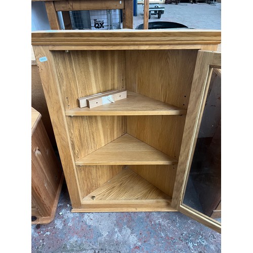 114B - A bespoke solid oak wall hanging corner cabinet - approx. 92cm high x 66cm wide x 35cm deep