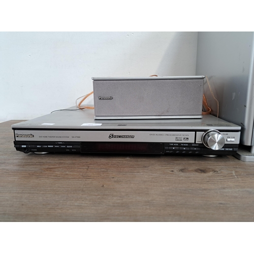 658 - A Panasonic SA-HT900 DVD home theatre sound system comprising five-disc changer DVD player, centre s... 