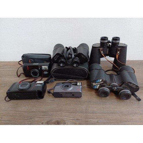 617 - Six items, three pairs of 10 x 50 binoculars, cased Zenith, Pathéscope and Chinon and three Nikon co... 