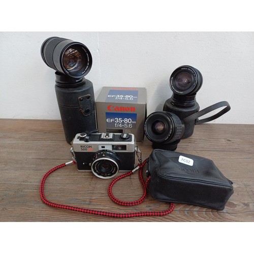 618 - Four items, one cased 1970s Ricoh 500 RF 35mm rangefinder camera, one boxed Canon EF 35-80mm 1:4-5.6... 