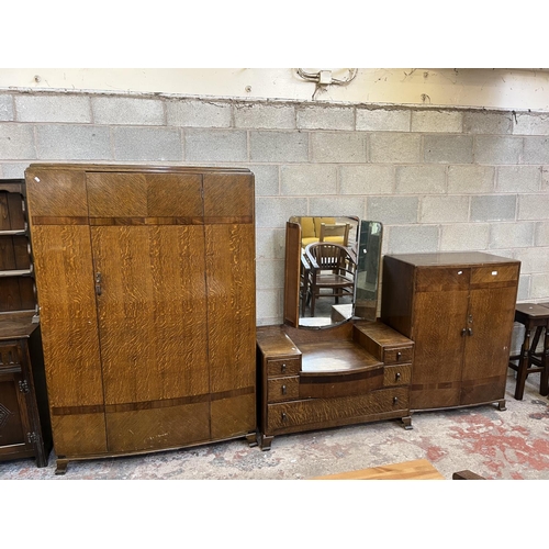 2 - A mid 20th century oak three piece bedroom suite