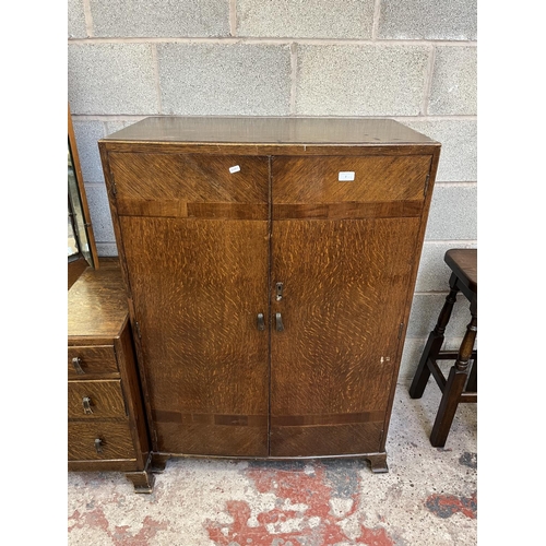 2 - A mid 20th century oak three piece bedroom suite