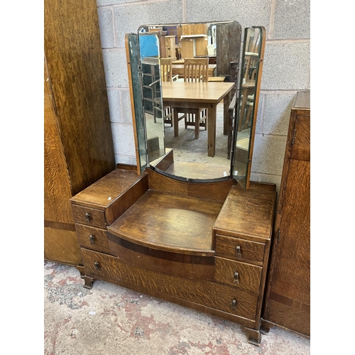 2 - A mid 20th century oak three piece bedroom suite