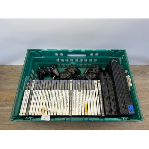 675 - A box containing three Sony PlayStation 2 consoles and games to include FIFA 06, Socom U.S. Navy Sea... 