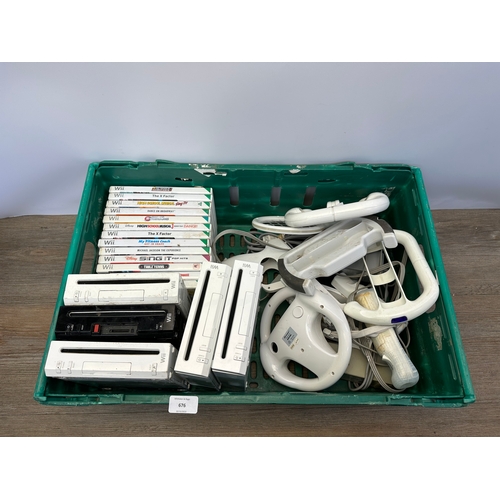 676 - A box containing five Nintendo Wii consoles, games and accessories